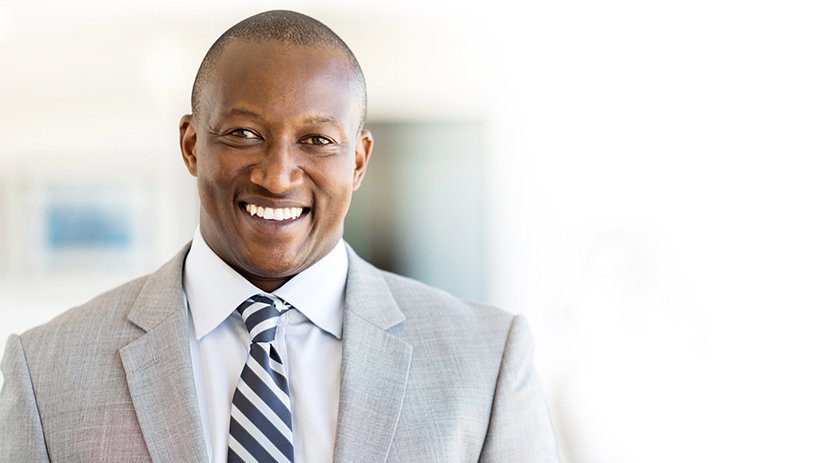 Young male insurance worker smiling