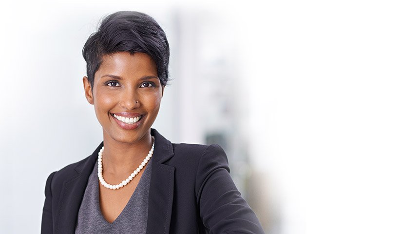 Young female insurance worker smiling